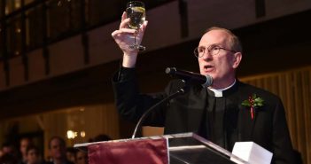 Father McShane Toasts at Holiday Reception