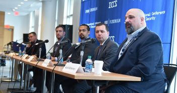 Jake Schmitter, Adam Marlatt, Keith Robertory, Michael R. Singer, and Ron Snyder, sit for the panel Connectivity and Cyber Safety in Natural Disaster Zones