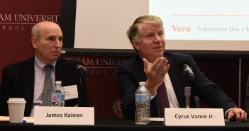 Fordham Law Professor James Kainen and New York County District Attorney Cyrus R. Vance Jr address an audience at Fordham School of Law