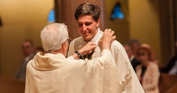 David C. Paternostro, S.J., is shown being vested at his ordination on June 9.