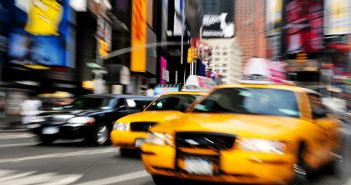New York City taxi drives through Times Square