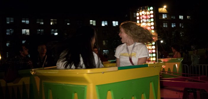Two women on a carnival ride at Rose Hill, Opening Day 2019