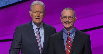 Host of Jeopardy Alex Trebek poses with Ed Condon, FCRH'84.