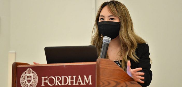 Student speaking at podium at AAPI graduation