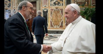 Henry Schwalbenberg shaking hands with the Pope